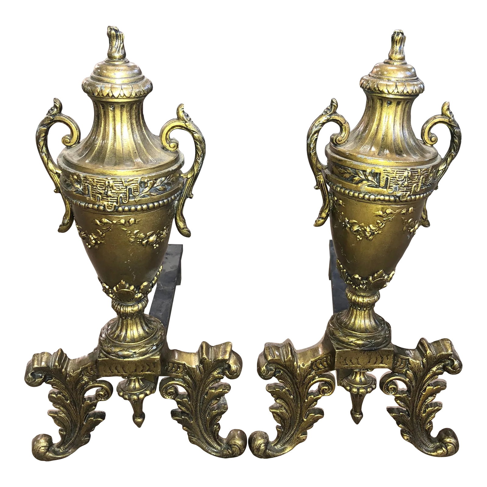Early 20th Century Antique Fireplace Andirons - a Pair: A very unique pair of urn formed andirons. Beautifully aged antique brass with a very soft abd warm patina. Sure to enhance your hearth and fireplace with charm and elegance of yesteryear. Condition: 