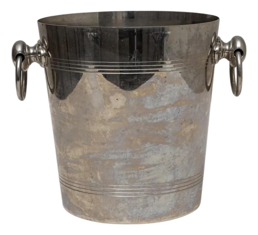20th Century French Silver Plated Champagne Bucket: A 20th Century French silver-plated champagne bucket defined by its classic tapered form and refined linear detailing. The body features horizontal incised bands near the top and bottom, adding