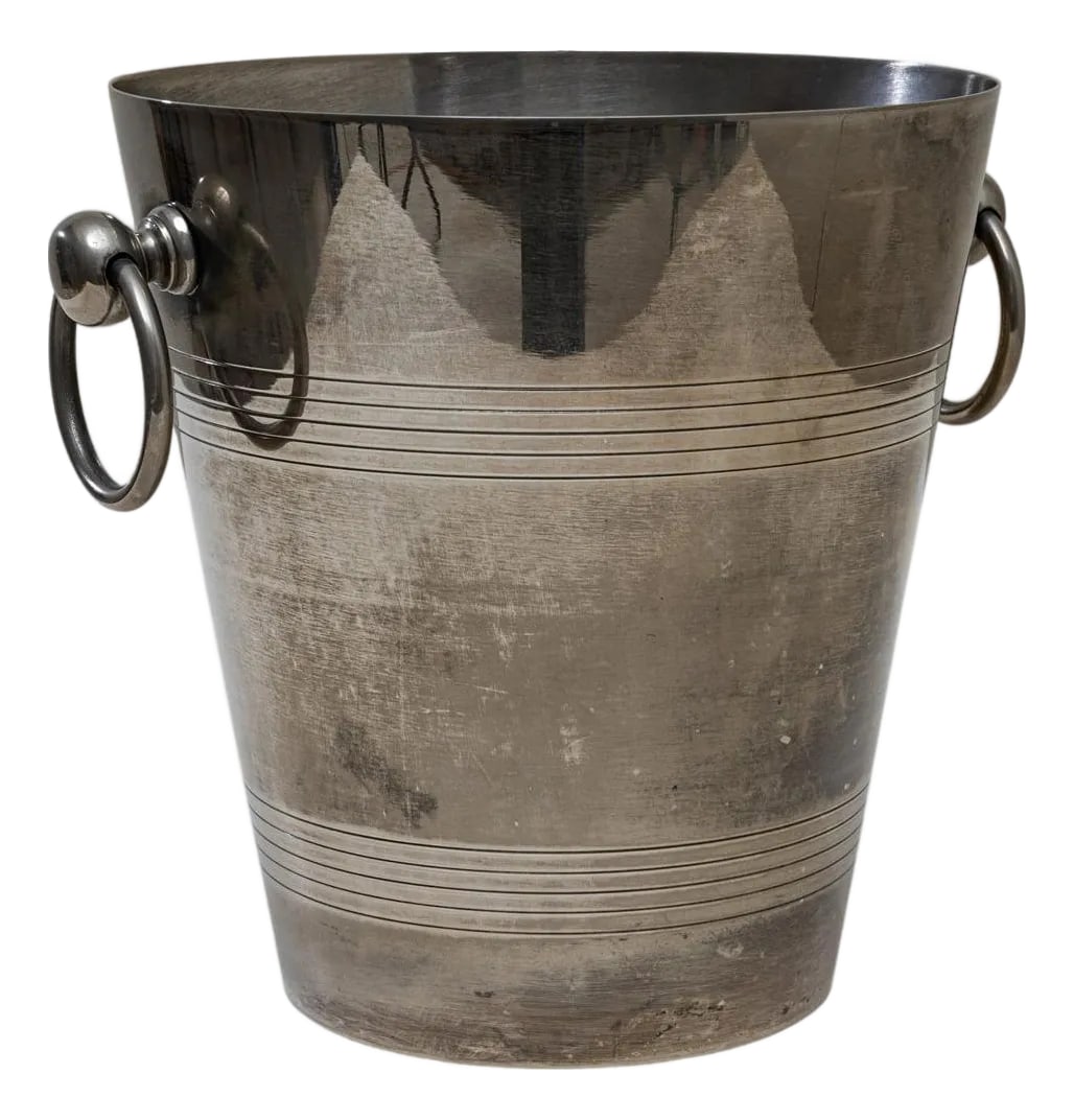 Mid 20th Century French Silver Plated Champagne Bucket: A 20th Century French silver-plated champagne bucket featuring a sleek, tapered silhouette and refined decorative banding. The smooth cylindrical body is accented with finely incised horizontal rings