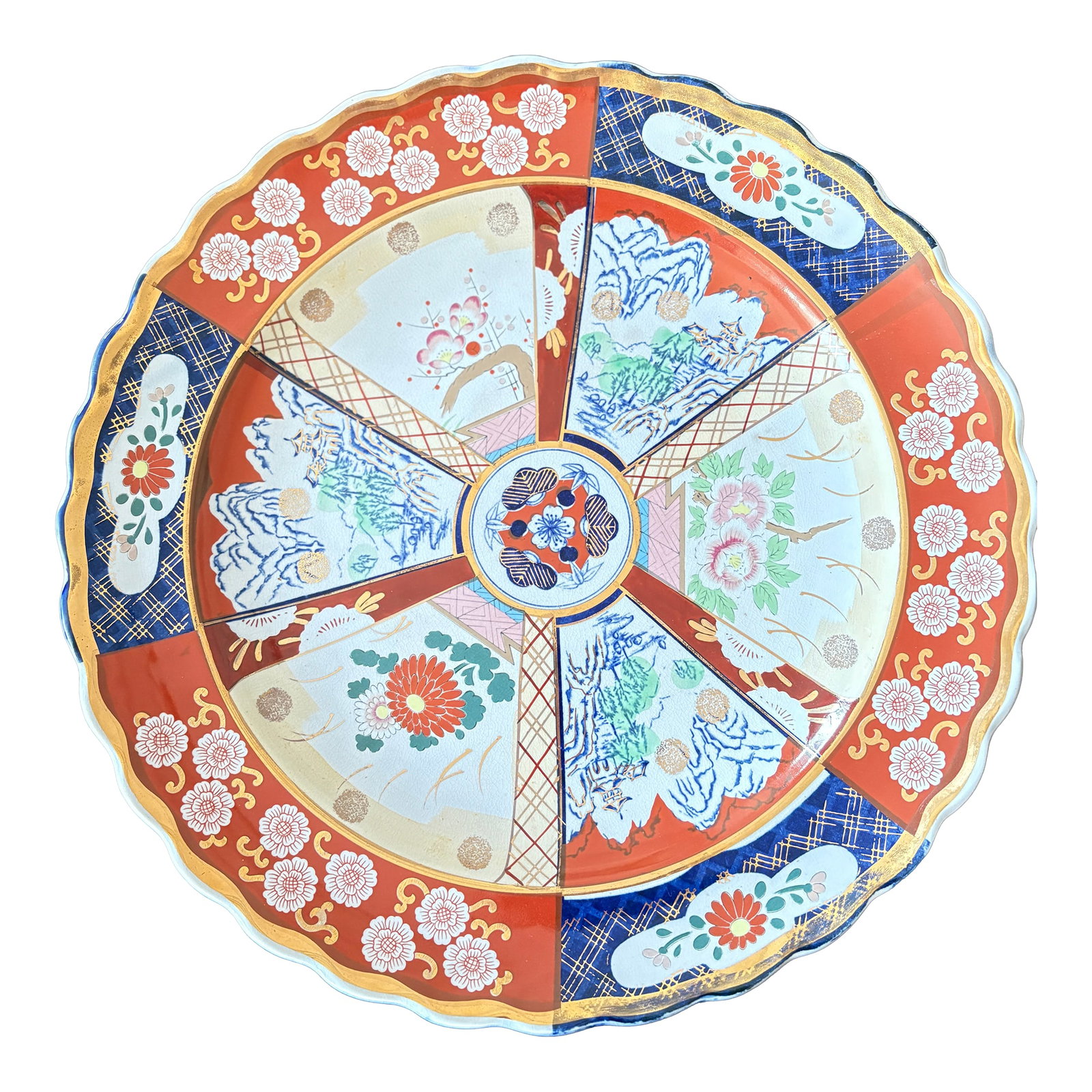 Japanese Imari Scalloped Porcelain Charger: Large Japanese Imari porcelain charger, AI says it's Meiji period (late 19th-early 20th century), I think it could be a reproduction. Hand-painted radial panel design with alternating landscape and