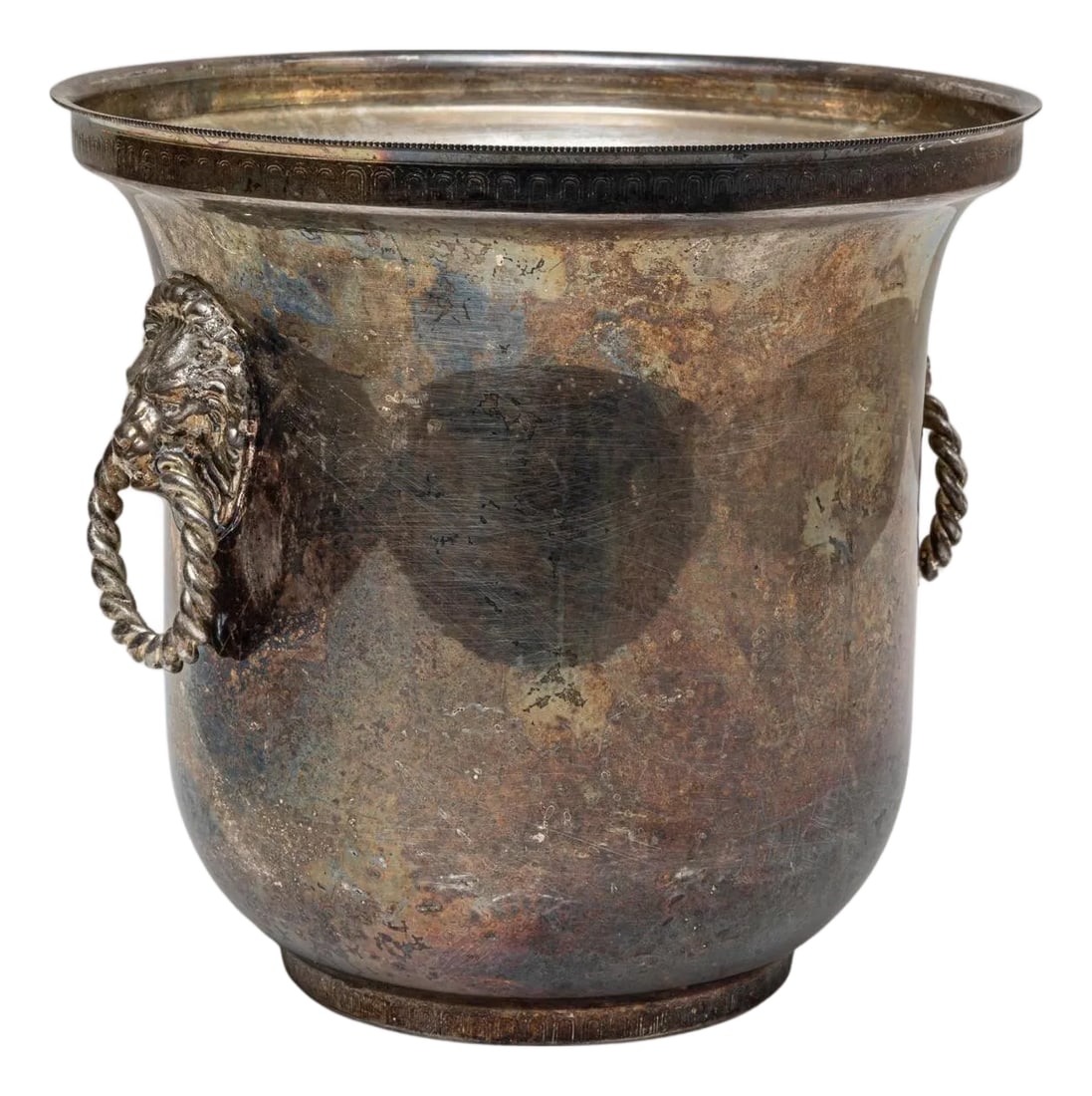 20th Century French Silver Plated Champagne Bucket: A 20th Century French silver-plated champagne bucket with a richly aged surface that highlights its decades of use and craftsmanship. The rounded, gently flared body sits on a small raised foot, givin