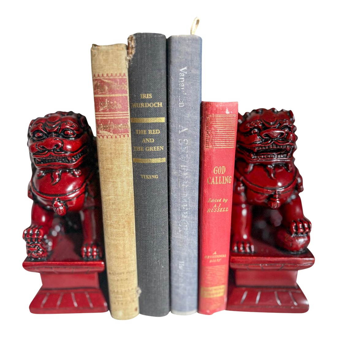 Guardian Resin Foo Dog Pair | Red Chinoiserie Bookends | Asian Home Decor: Chinese foo dogs in a rich ox-blood red resin. One lion rests a paw on an embroidered ball (symbolizing power), while the other protects a cub (symbolizing nurturing) - a traditional male/female pairi