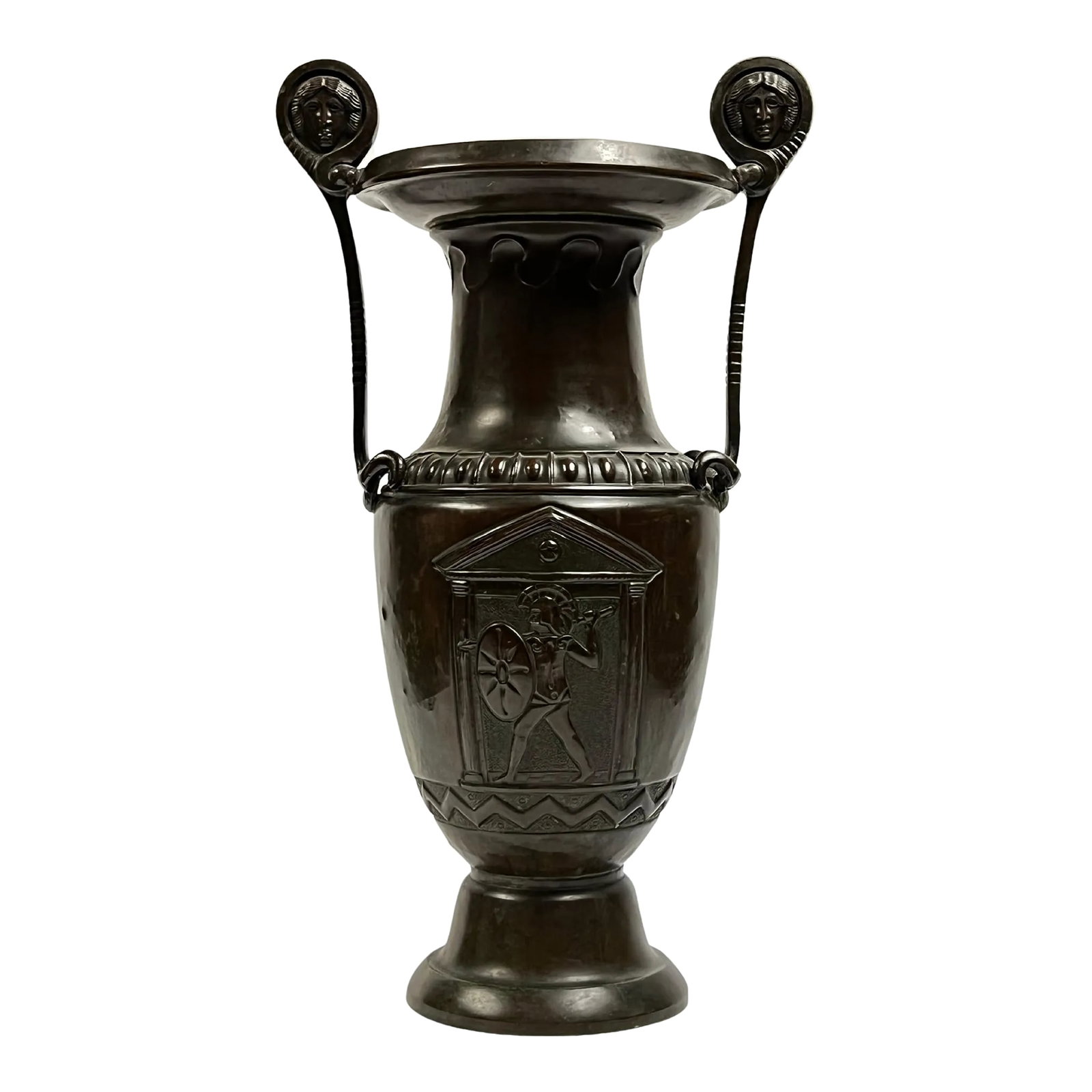 Bronze Greek Volute Krater Vase: Greek Volute Krater in patinated bronze with cartouches depicting armed soldiers with handles depicting masks. Condition: Alterations: Unknown Imperfections: Some Imperfections Condition Notes: Good W