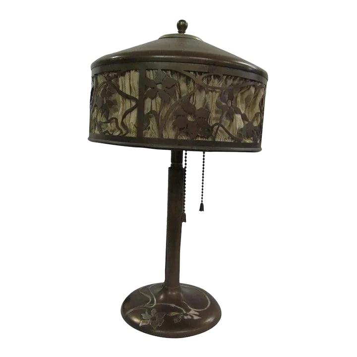 1910s Heinz Bronze Lamps And Silver: Heinz Lamp Bronze and Silver arts and crafts style. H: 16" Base: 6" Shade: 8.5" Condition: Alterations: Unknown Imperfections: Some Imperfections Condition Notes: Gently used Materials &