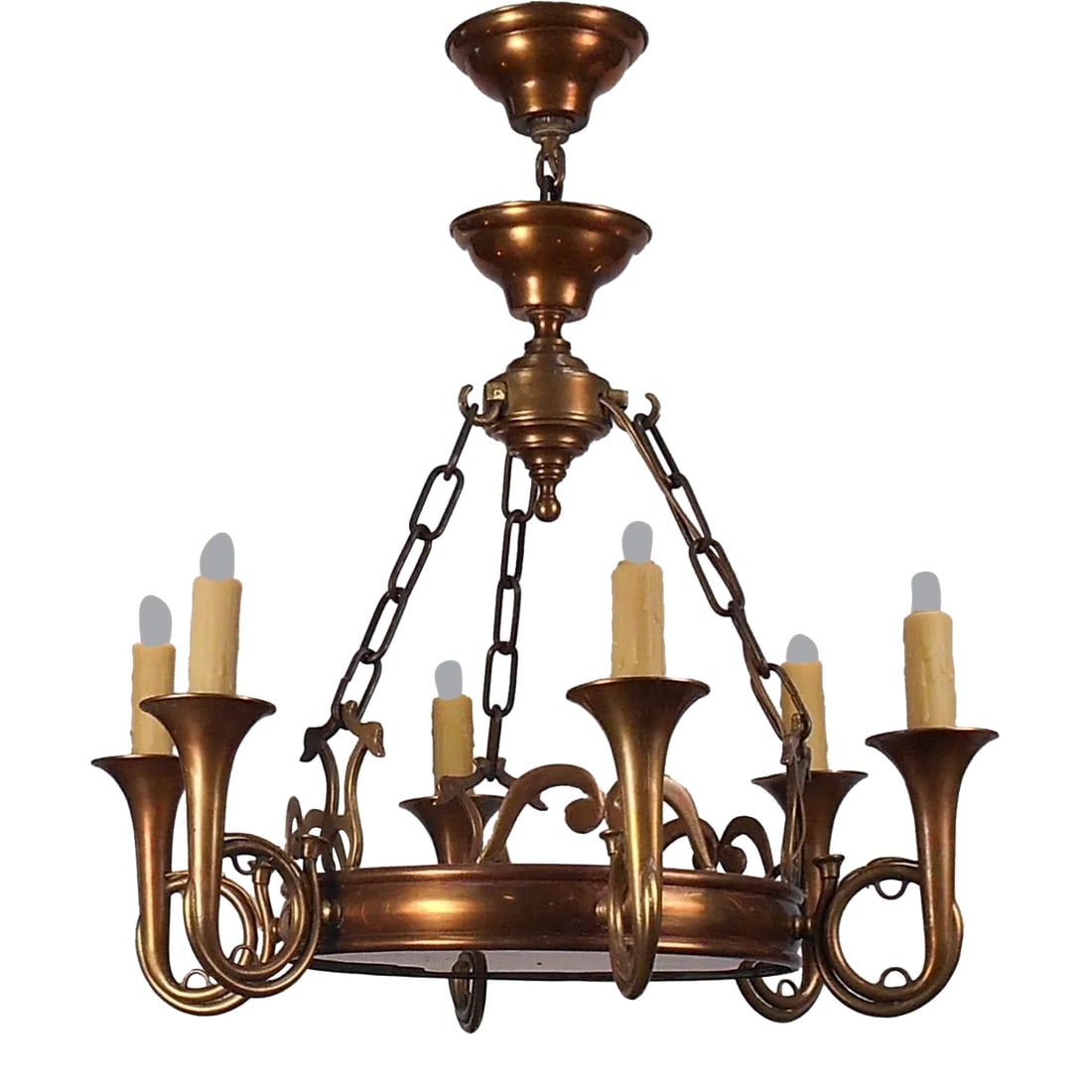 1970s Copper & Brass Bugle Arm Chandelier: Presented is a copper and brass chandelier featuring six bugle arms with 4" candle base sockets covered in gold faux beeswax candle sleeves. The arms connect to a central pan with a copper bottom and