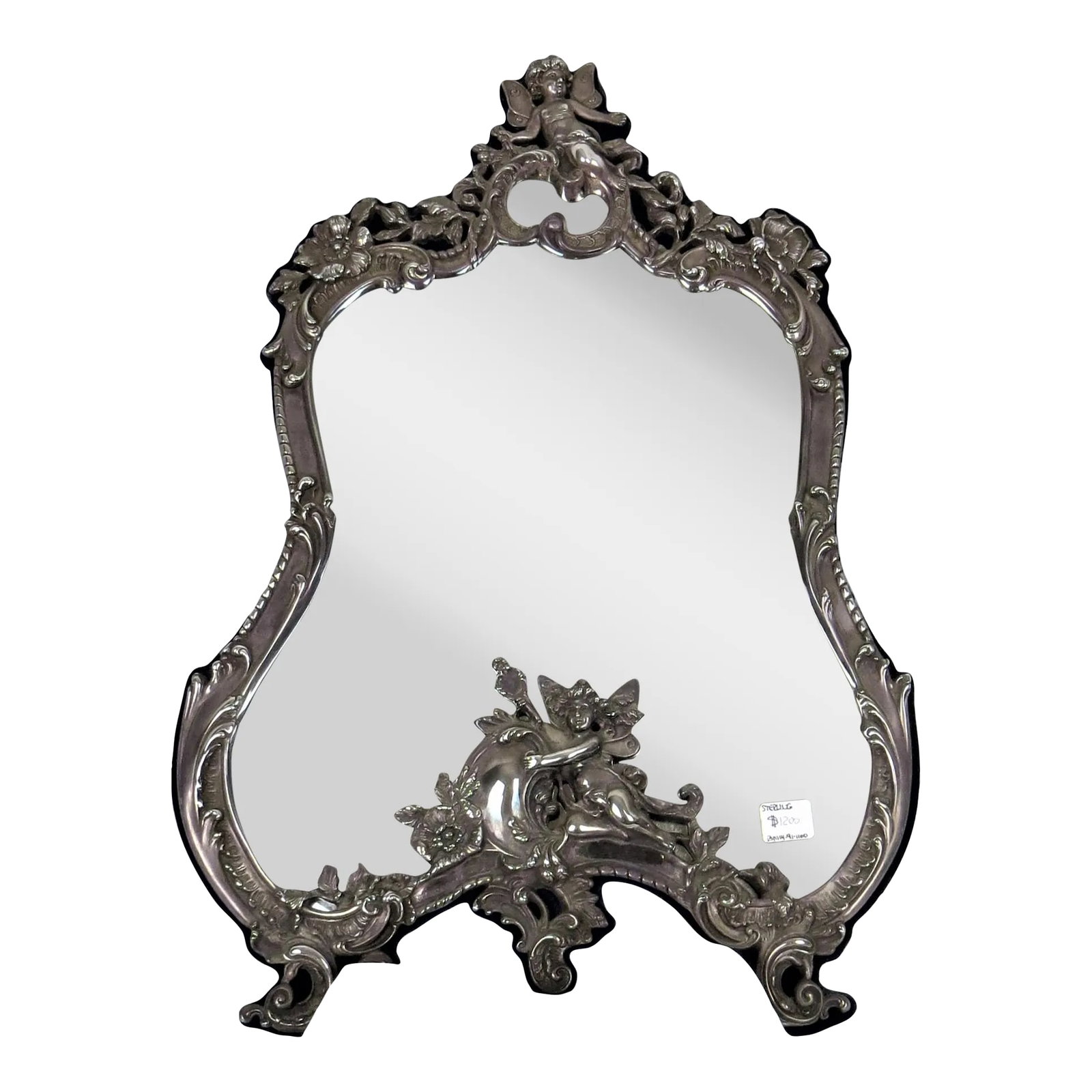 1950s Vanity Sterling Silver Mirror With Easel Stand and Cherubs: A vintage sterling silver easel stand mirror. Ornate repose cherubs, flowers and scrolls. Back cover with fabric blue cobalt. Marked 925 (sterling) on bottom right. Great condition, no damage or marks