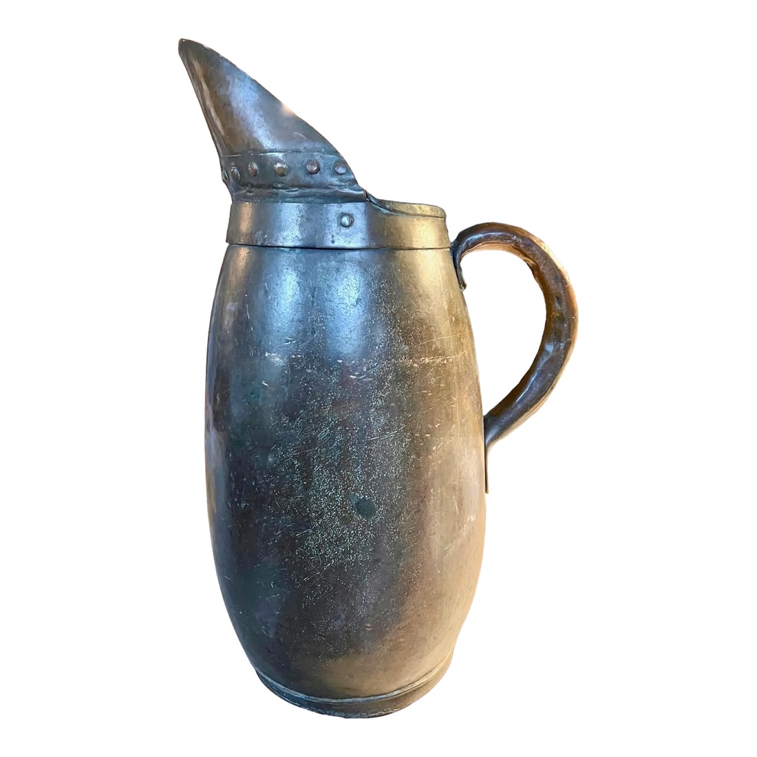 Early 17th Century Copper Jug: This is a rare find, indeed! Dating to the early 17th century (1600-1640), this lovely copper jug is most likely Dutch or German. The deep rich and almost glass-like brown patina might well be