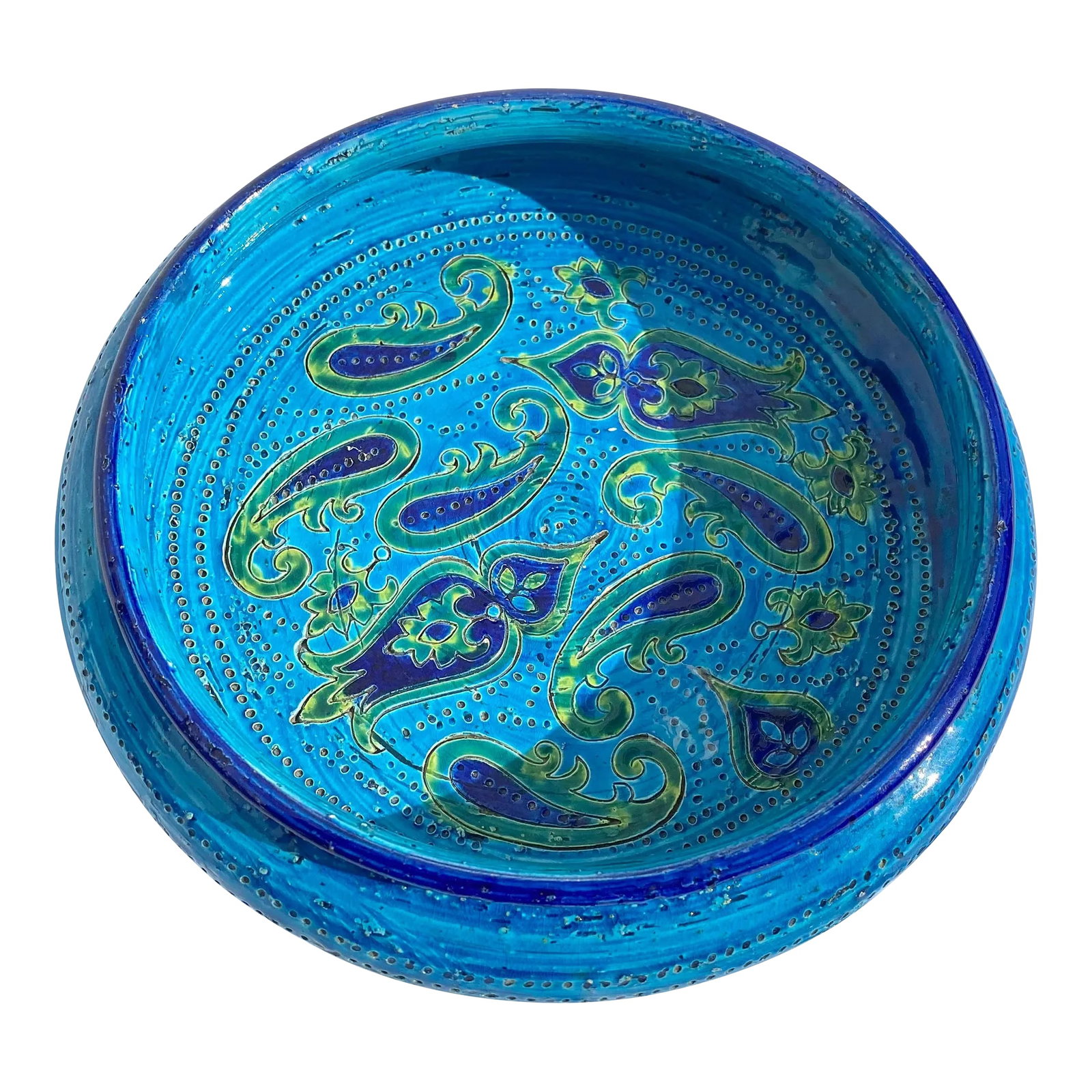 Vintage Ceramic Decorative Bowl: This is a handmade vintage ceramic/pottery decorative bowl. The entire bottom of the bowl has a paisley design too it the is painted with shades of green. The entire vessel of the bowl is painted in