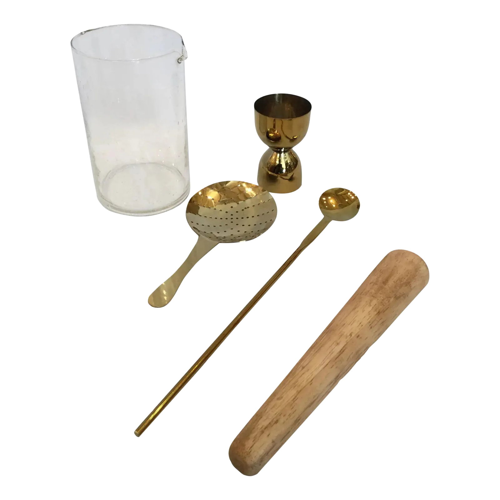 Contemporary Cocktail Set- 5 Pieces: This Cocktail set is perfect for any bar. Would look great on display or in use at a party. It is complete with 1 seeded glass, mixing glass, 1 beechwood muddler, 1 gold-plated stainless steel bar