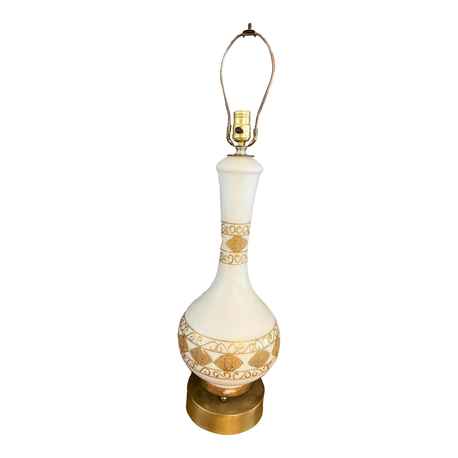 Vintage Mid 20th Century Hollywood Regency Lamp: Beautiful large mid century Hollywood Regency style lamp in white porcelain with gilt accents featuring scroll and leaf pattern on a brass base Lampshade for display only Condition: Alterations: Origi