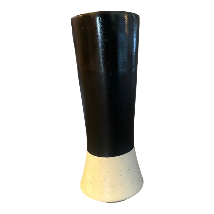 1970s Black and White Color-Blocked Mexican Vase: Black and White Color-Blocked Vase Ceramic vase Made in Mexico The dimensions are 5.25"W at the top, 6"W at the bottom, 13.5"H Condition: Alterations: Original Condition Unaltered Imperfections: Some
