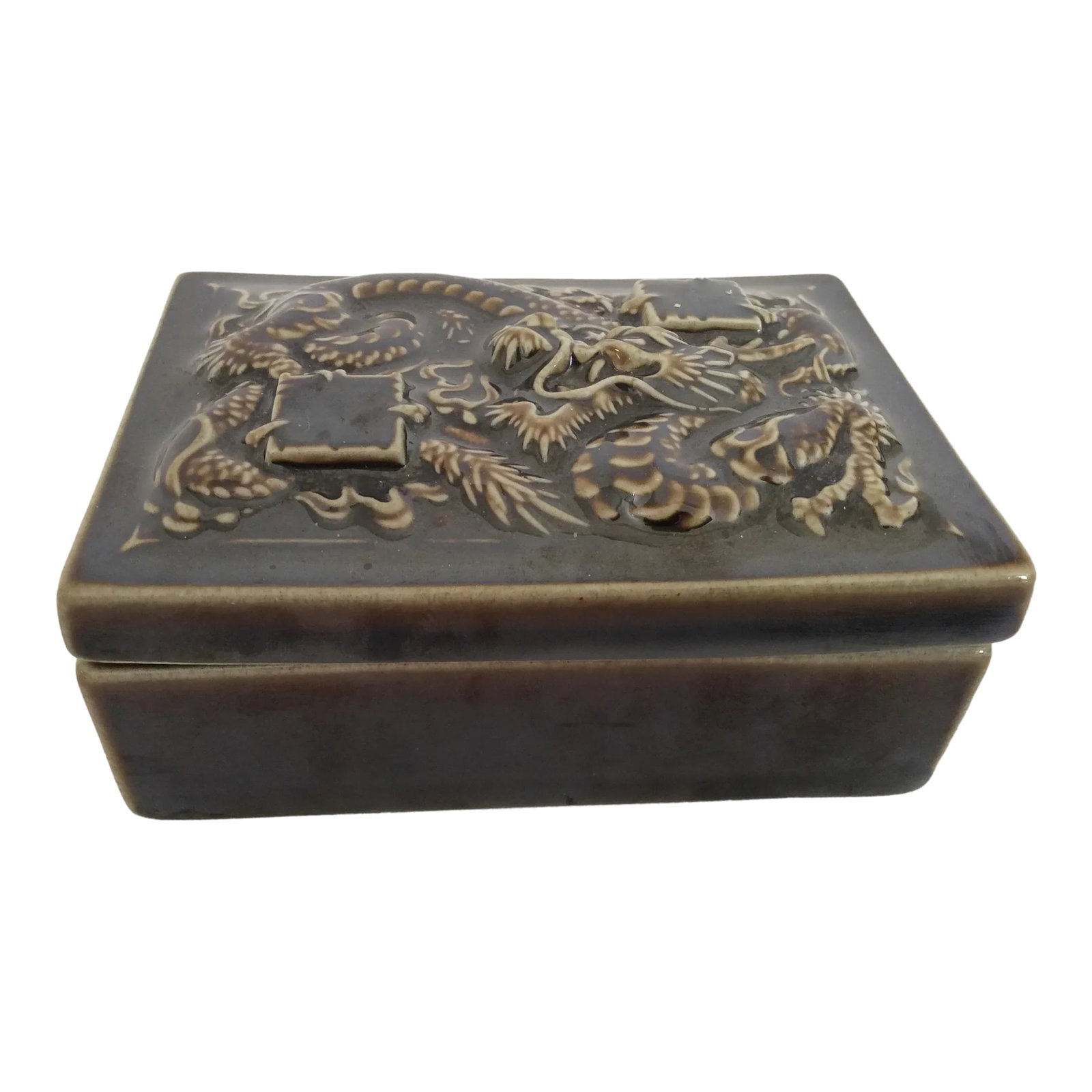 1930s Rookwood Pottery Dragon Trinket Box: This Rookwood Pottery Chinese Dragon motif trinket box is a rare find. The box is glazed in a high gloss deep brown with the Rookwood Pottery makers mark stamped to the underside. Condition: Alteratio