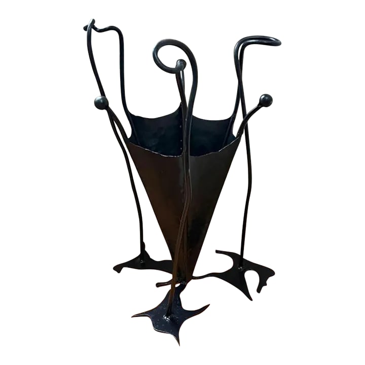 1960s Mid-Century Modern Brutalist Hand Wrought Iron Umbrella Stand: Perhaps, the first thought that comes to mind when seeing this Brutalist style MCM hand wrought iron umbrella and stick stand is Dr. Seuss. One can well imagine this being on the set of the movie