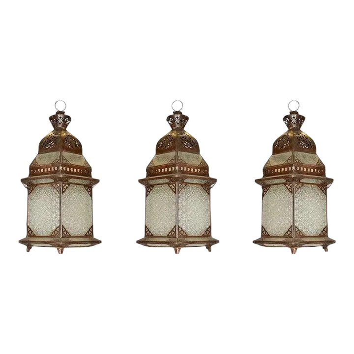 1920s Oriental Style Metal Lanterns - Set of 3: Set of three oriental style metal and glass lanterns, two with ceramic sockets and wiring, one without socket. Condition: Alterations: Original Design Modified Imperfections: Some Imperfections