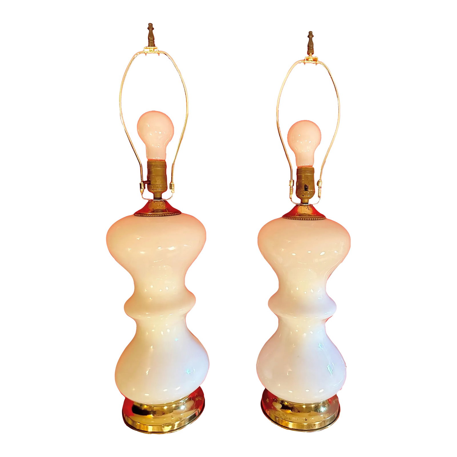 1950s Milk Glass Table Lamp Pair: Stunning pair of circa-1950s milk glass lamps in very good condition. The glass bases have no damage or visible imperfections. Rewired with polarized plugs. We reused the vintage sockets, which were i