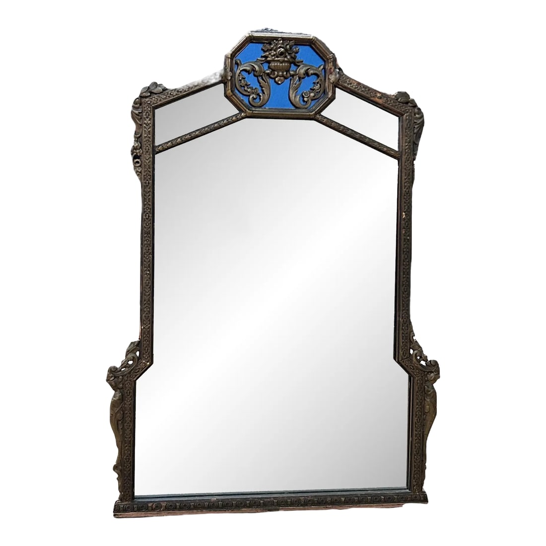 Antique Ornate Carved Wood Wall Mirror: An antique wall mirror that is beautifully hand carved wood. It is accented on the top with blue enameling. Condition: Alterations: Original Condition Unaltered Imperfections: Some Imperfections