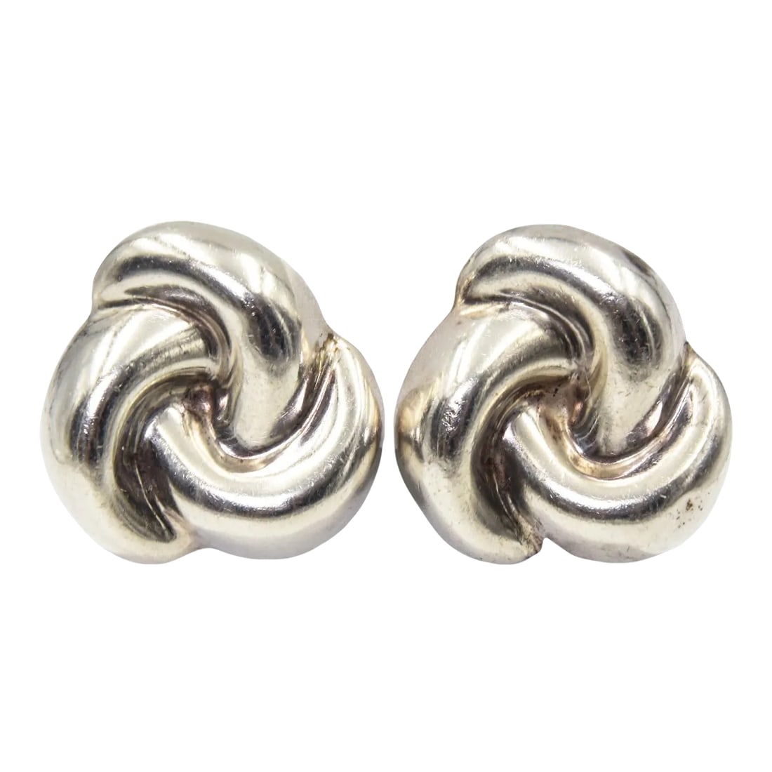 Mexican Sterling Silver Knot Clip-on Earrings - 2 Pieces: Pair of vintage Mexico Mexican knot design clip on earrings marked 925 Mexico Nestor TJ24. Condition: Alterations: Unknown Imperfections: Some Imperfections Condition Notes: Fair Wear consistent with