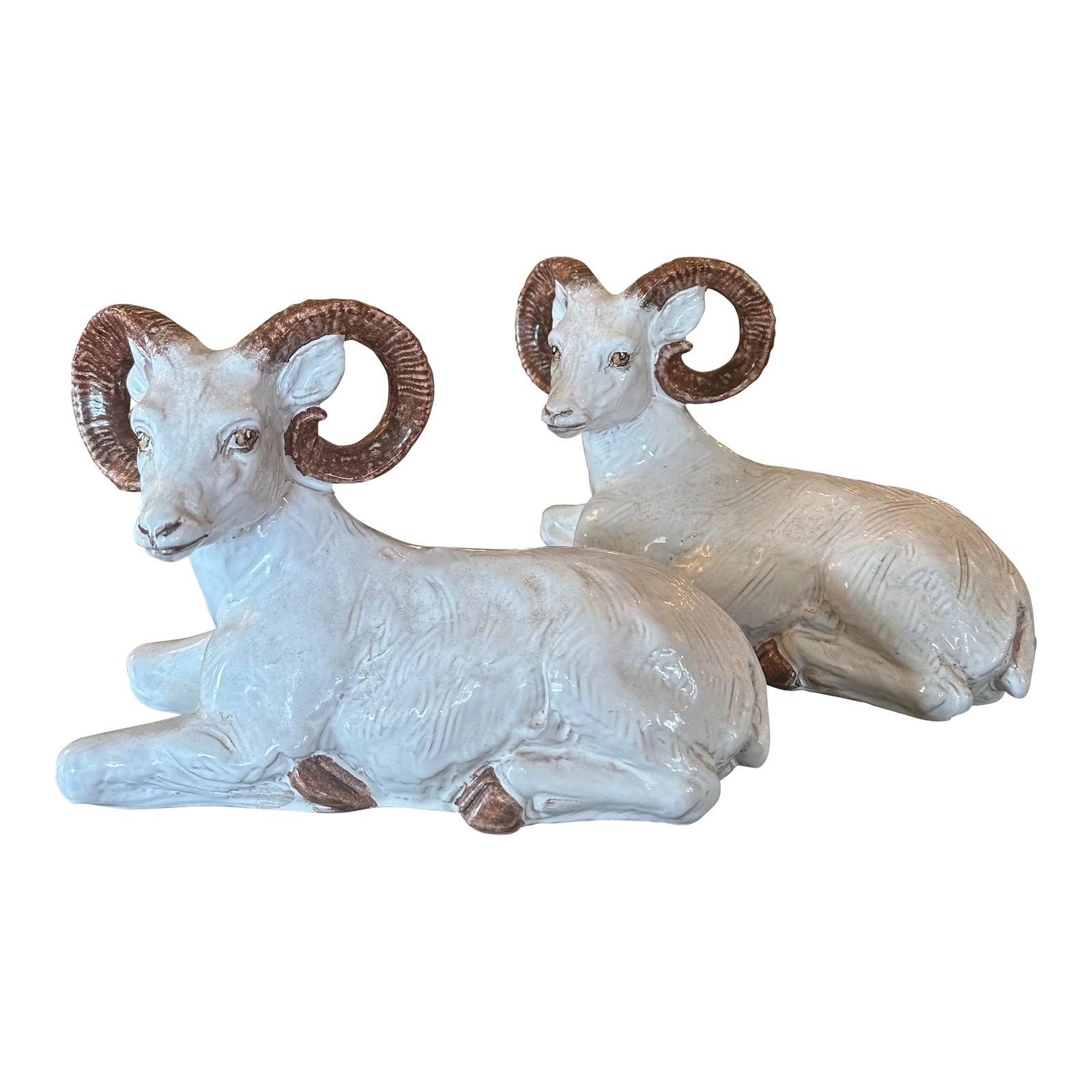 Mid 20th Century Italian Glazed Terra Cotta Rams- a Pair: Decorative glazed terra cotta rams. Made in Italy. Beautiful features and soft colors Condition: Alterations: Original Condition Unaltered Imperfections: Some Imperfections Condition Notes: Really