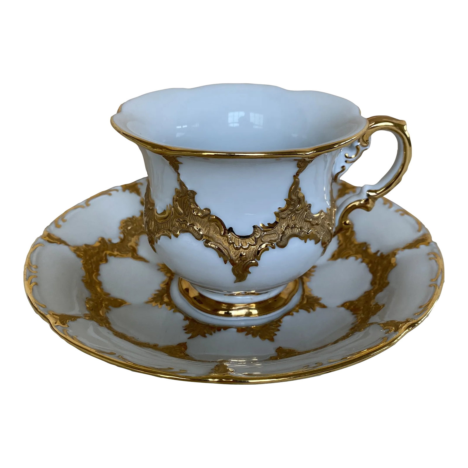 Meissen Gilded Tea Cup and Saucer: Meissen Porcelain Tea Cup And Saucer. One cup and one saucer. Meissen Porcelain cup and saucer. Richly decorated with gold. An absolutely stunning Meissen teacup and saucer with thick gold overlay. Ba