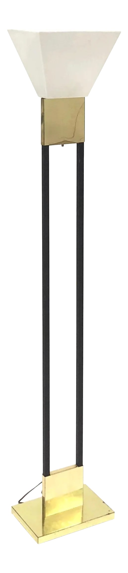 1970s Vintage Brass and Black Metal Torchiere Lamp: This is a vintage art deco revival lamp from the 1970s. The torchiere lamp features brass and black metal lamp and an acrylic shade The lamp measures 67.5" high, the base is 12" wide and 8" deep, the