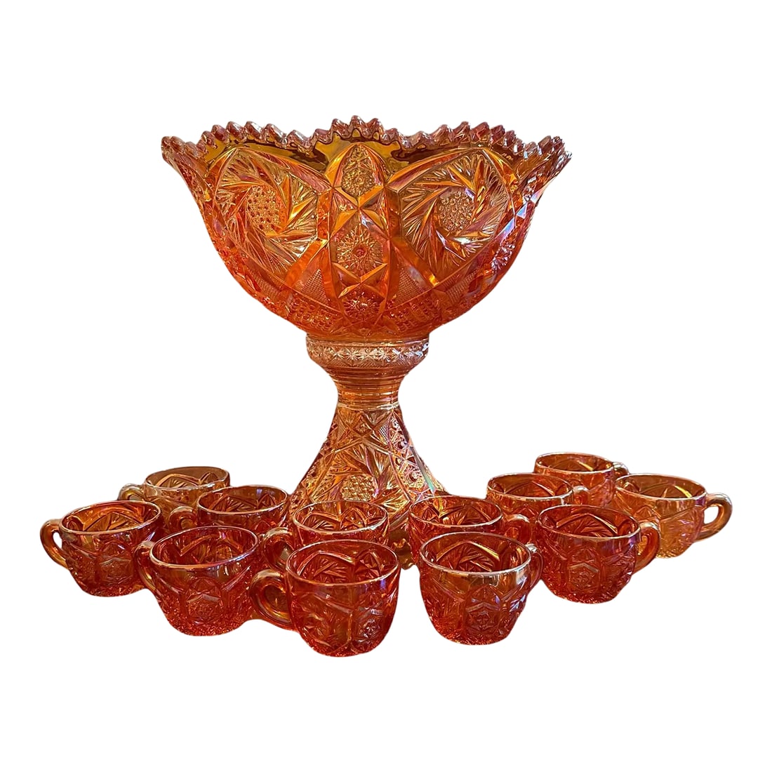 Imperial Iridescent Glass Punch Bowl Set, Marigold: Stunning Whirling Star Marigold iridescent glass punch bowl from Imperial Glass Company. This vintage piece has a striking pedestal stand that can be removed and used without, or separated for easier