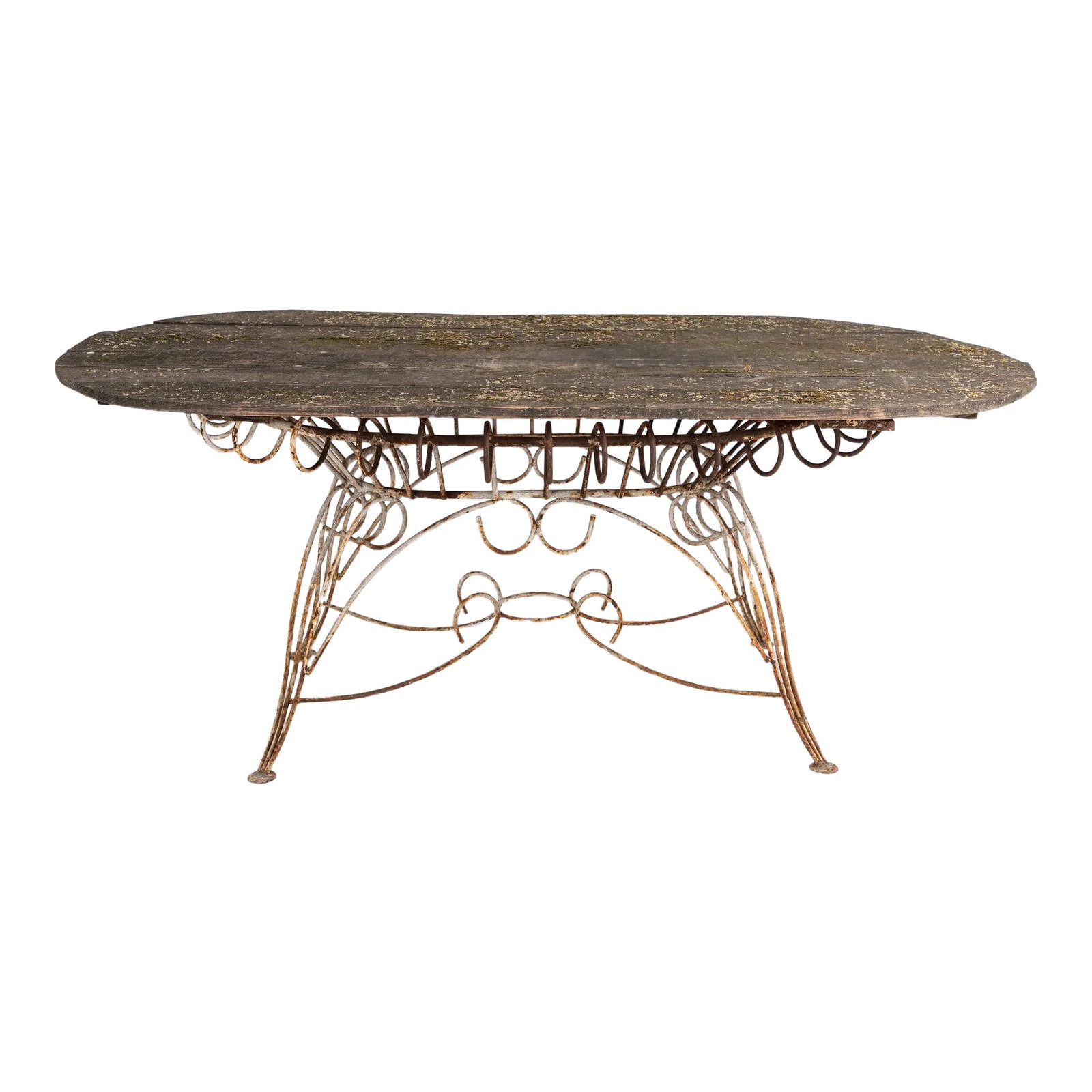 White Iron and Wood Topped Garden Dining Table, France 1930s: This early 20th Century French oval dining has a later wooden top as a testament to craftsmanship, weathered yet resilient. Beneath, an intricate scrolling iron base, reminiscent of Art Nouveau