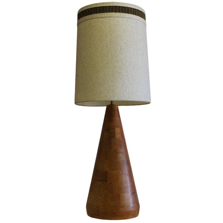 Patchwork Lamp: Massive walnut patchwork wood lamp possibly by a company called Amtercraft out of Clovis, Ca. Wood base is 27.5" height, base is 14" diameter and total height with shade is 50.5" height. Lamp has