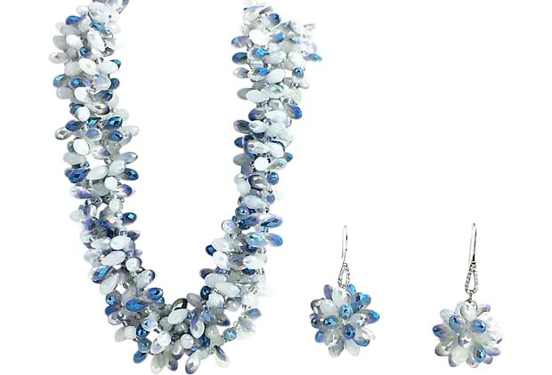 Faceted Blue Crystal Necklace & Earrings: Stunning Necklace & Earring Suite featuring faceted teardrop blue and opalescent crystal beads with rhodium plated sterling silver hardware. The Necklace has four strands of 11mm crystal beads strung 
