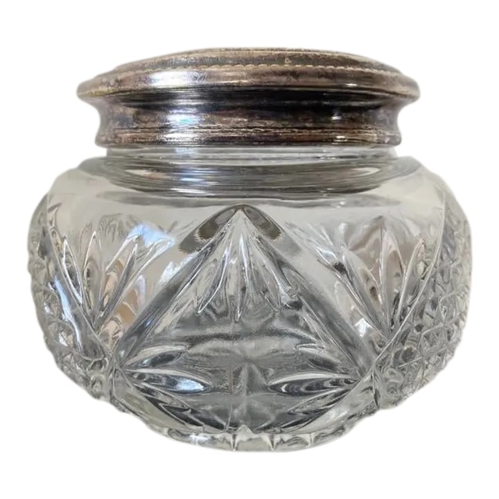 English Art Glass and Silverplate Jewelry Box: A beautiful art glass jar and silver plate lid, circa early 20th century, England. Silver lid is decorated with embossed botanical design in Art Nouveau style. The box has ornate art glass patterns