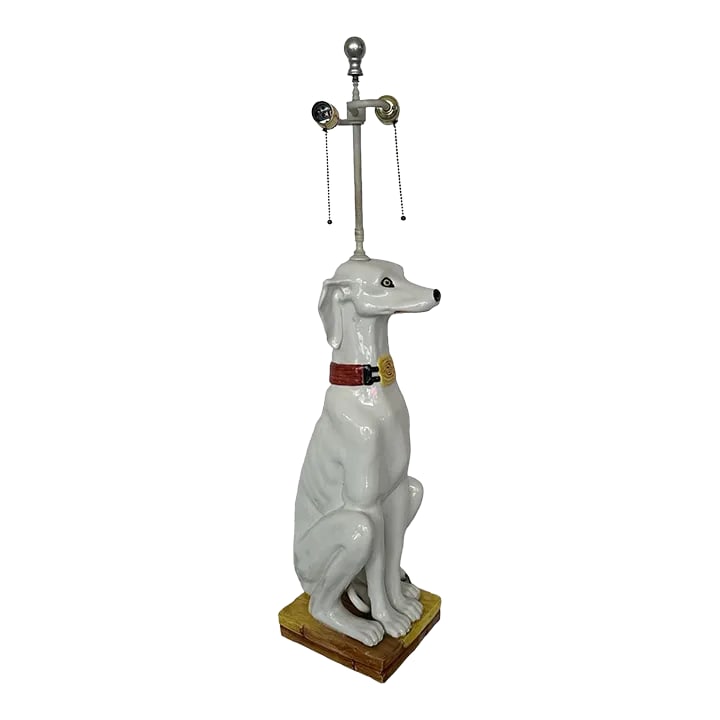 1960s Italian Ceramic Dog Lamp: Vintage life size Greyhound dog. It is Italian, glazed ceramic. It is in good condition. The height from the top is 37.5". Condition: Alterations: Original Condition Unaltered Imperfections: Some
