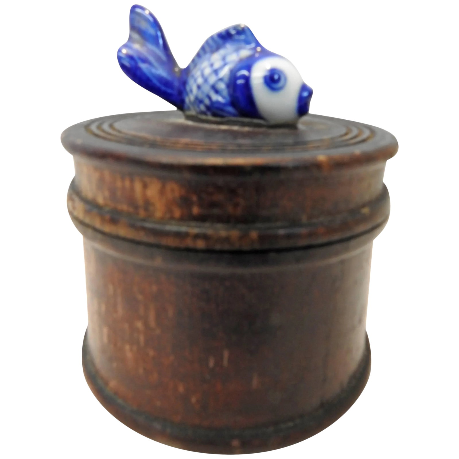Round Wooden Box With Porcelain Koi Fish on Lid: A hand-painted porcelain koi fish is perched on top of the lid of this round wooden box. The lid comes off for you to store your treasures inside. Hand-Painted Porcelain, Hand-Crafted Wood Condition: