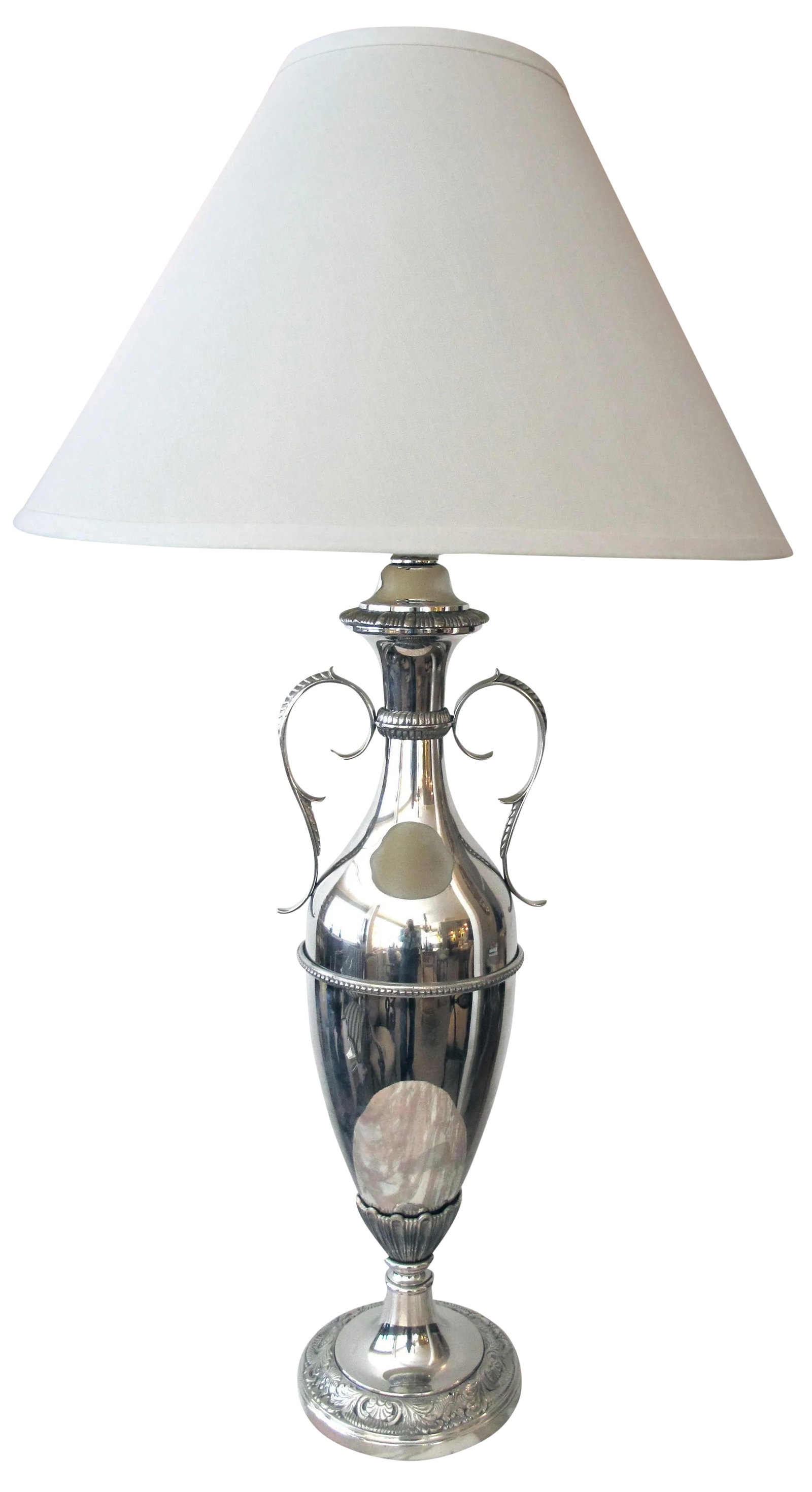 A Sleek American Art Deco Nickel-Plated Urn-Form Lamp: A sleek American art deco nickel-plated double-handled urn now mounted as a lamp; with slender flared neck flanked by graceful handles; above an elongated bulbous body over a splayed base with floral 