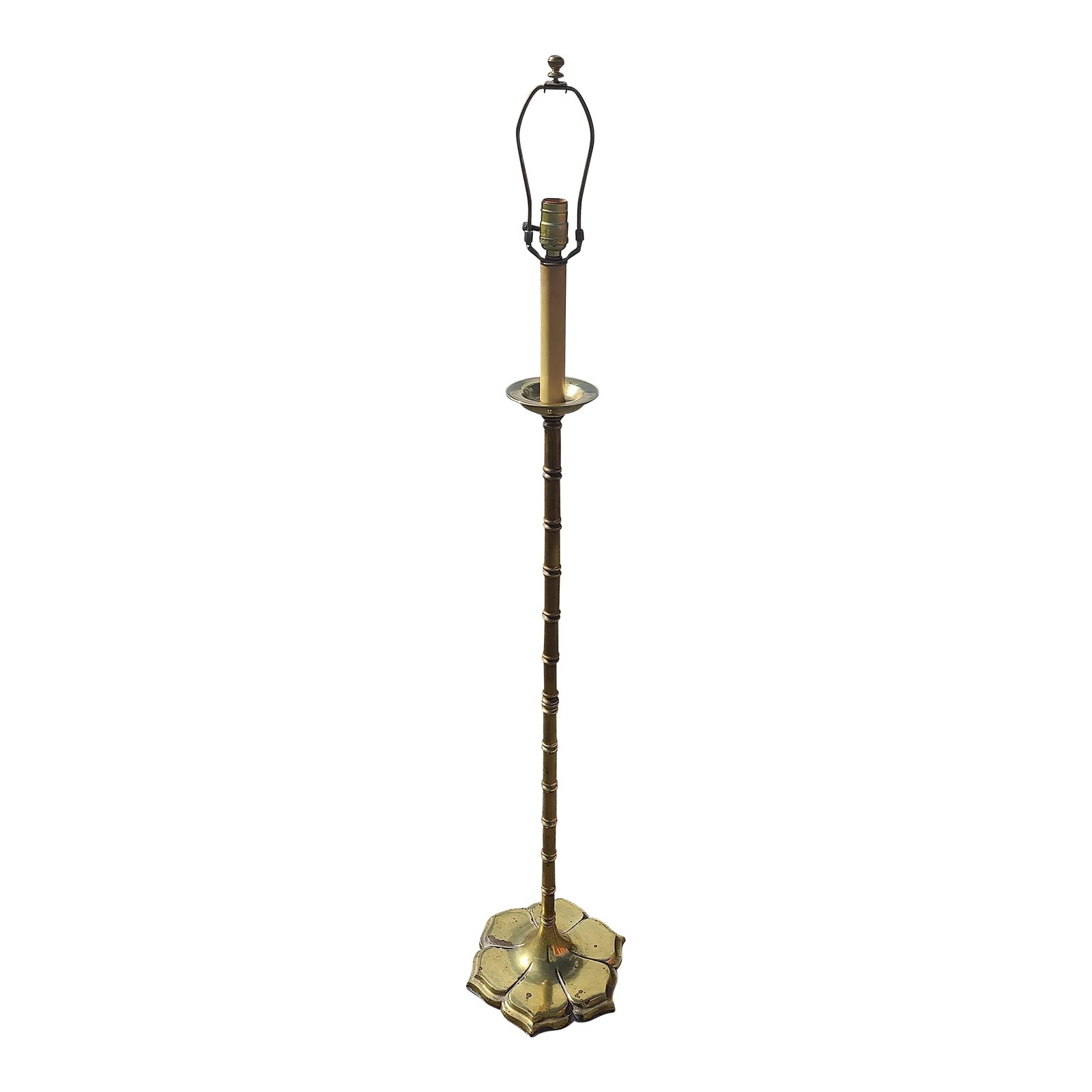 Vintage Ethan Allen Brass Floor Lamp: This lamp's slender, graceful silhouette is complemented by intricate details, from the intricately carved base to the softly curved neck. it is perfectly suited to both traditional and modern