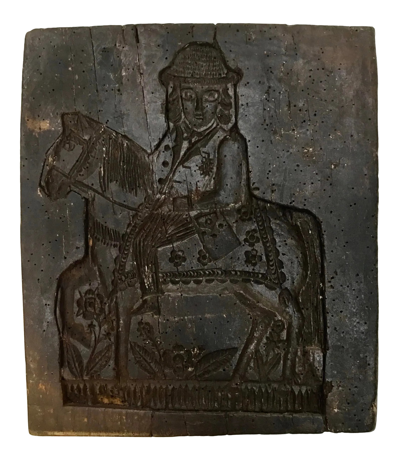 18th Century Continental Carved Wood Cake Mold: Charming antique carving depicting man on the horse among flowers . cracks, wormholes and very old repairs only adding to "antique charm". Condition: Alterations: Original Condition Unaltered