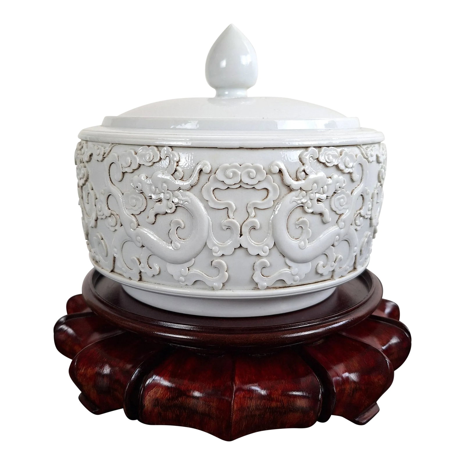 Chinese Blanc De Chine Lidded Archaic Dragon Bowl: Chinese Blanc de Chine lidded archaic dragon bowl, a finely formed, heavy, lidded bowl with a peach finial and stepped lip, having a white glazed exterior, interior and inset base. The side of the bow
