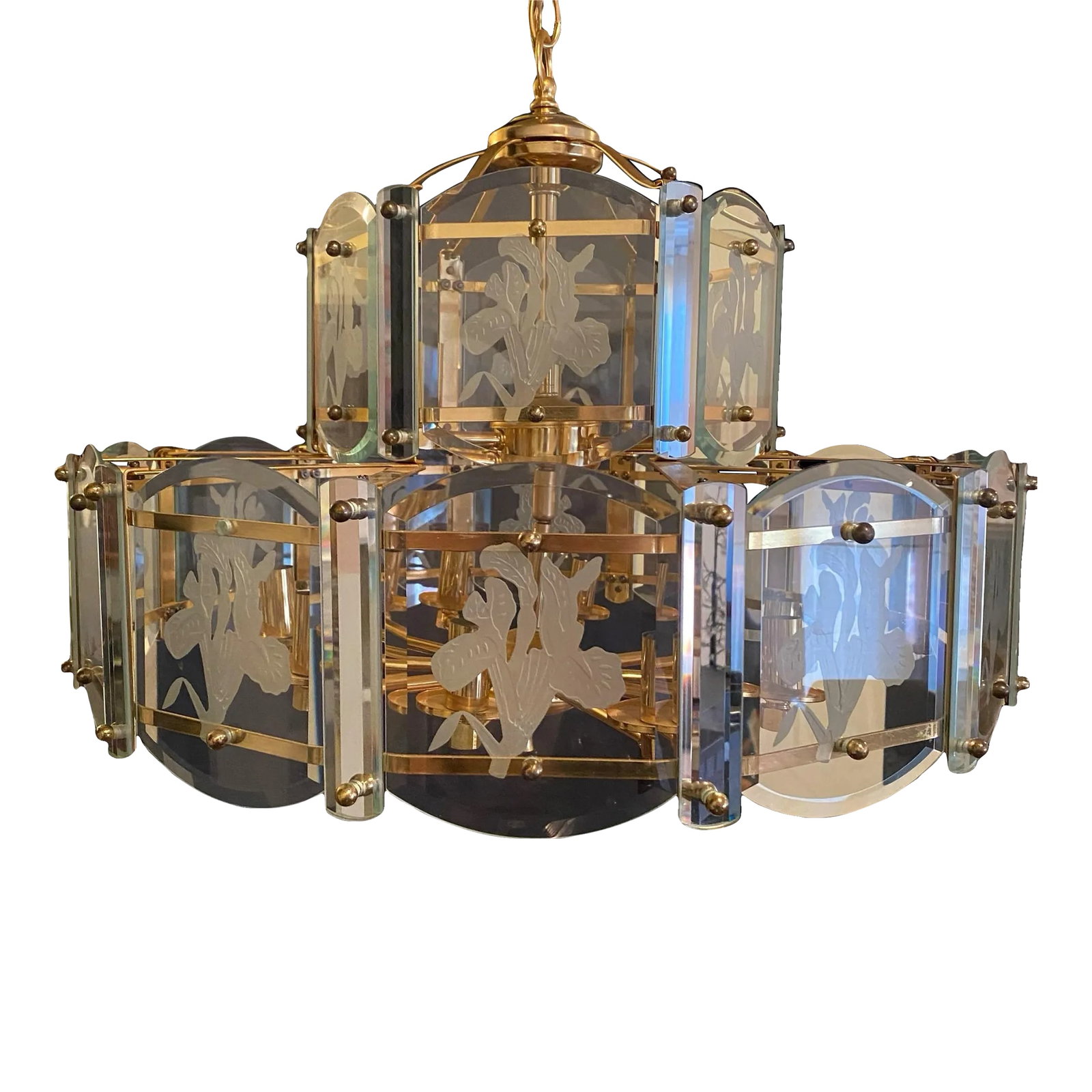 1980s Art Deco Fredrick Ramond Style Glass Etched Lilies Chandelier Fixture: Chandelier measures 23" wide x 18" tall. Chain and brass plate measures 22" in length 13 lights in total Max 40 watts each bulb The 1980s Fredrick Ramond style chandelier is an elegant brass and glass