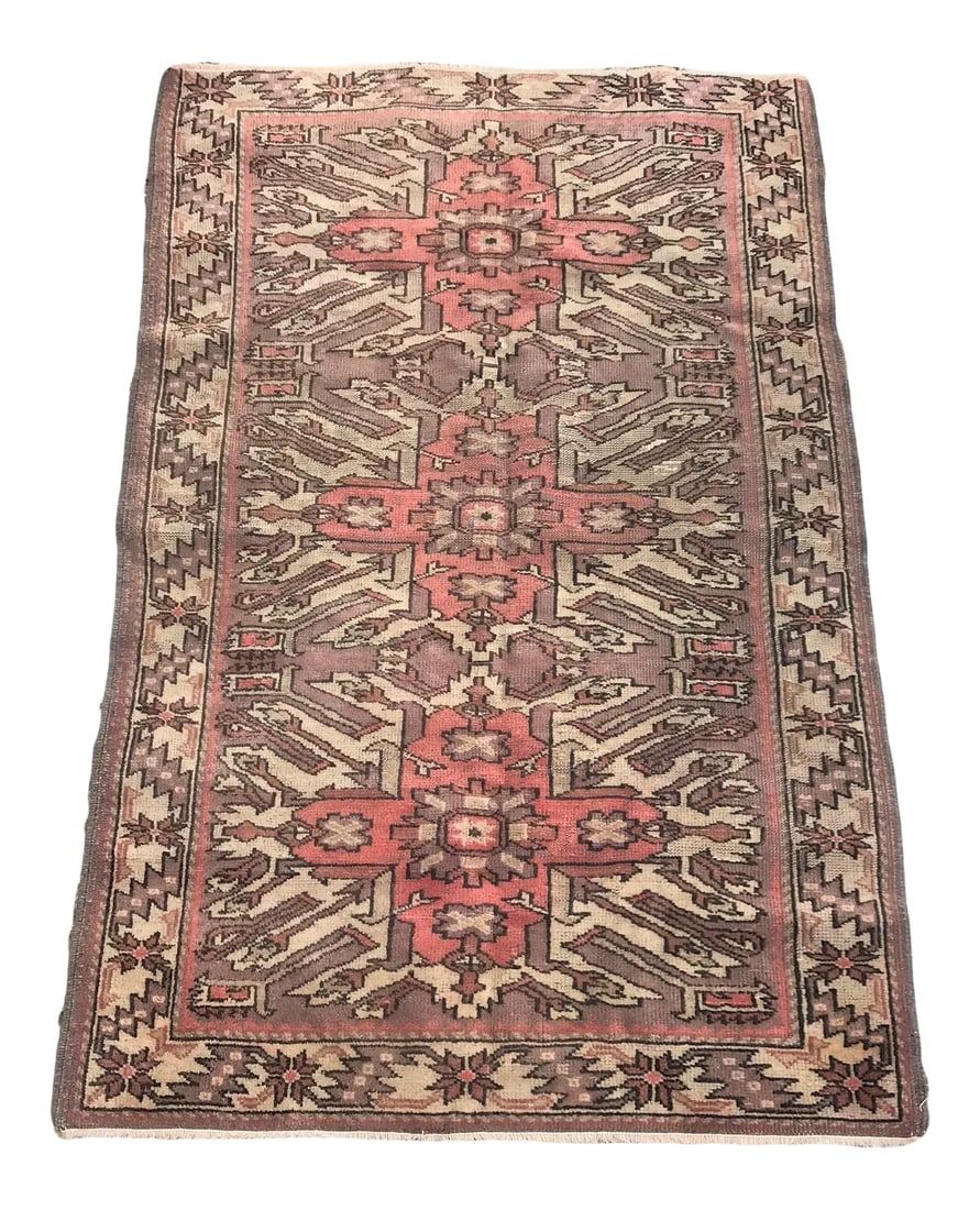 Hand Made Vintage Turkish Area Rug- 3'4" X 5'7": This rug is from Turkey. It is very unique in that the design is from the Caucausus mountains. The field has a series of medallions that have crosses in them. The colors are more pink and lavenders.