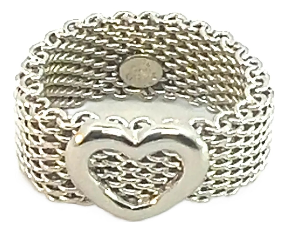 1990s Tiffany & Co Estate Somerset Heart Ring 7 Silver, Size 7: Authentic Tiffany & Co Estate Somerset Heart Ring Size 7 Silver height 9.60 mm TIF609 This elegant Authentic Tiffany & Co ring is made of sterling silver and has a weight of 10 grams. DETAILS Style:
