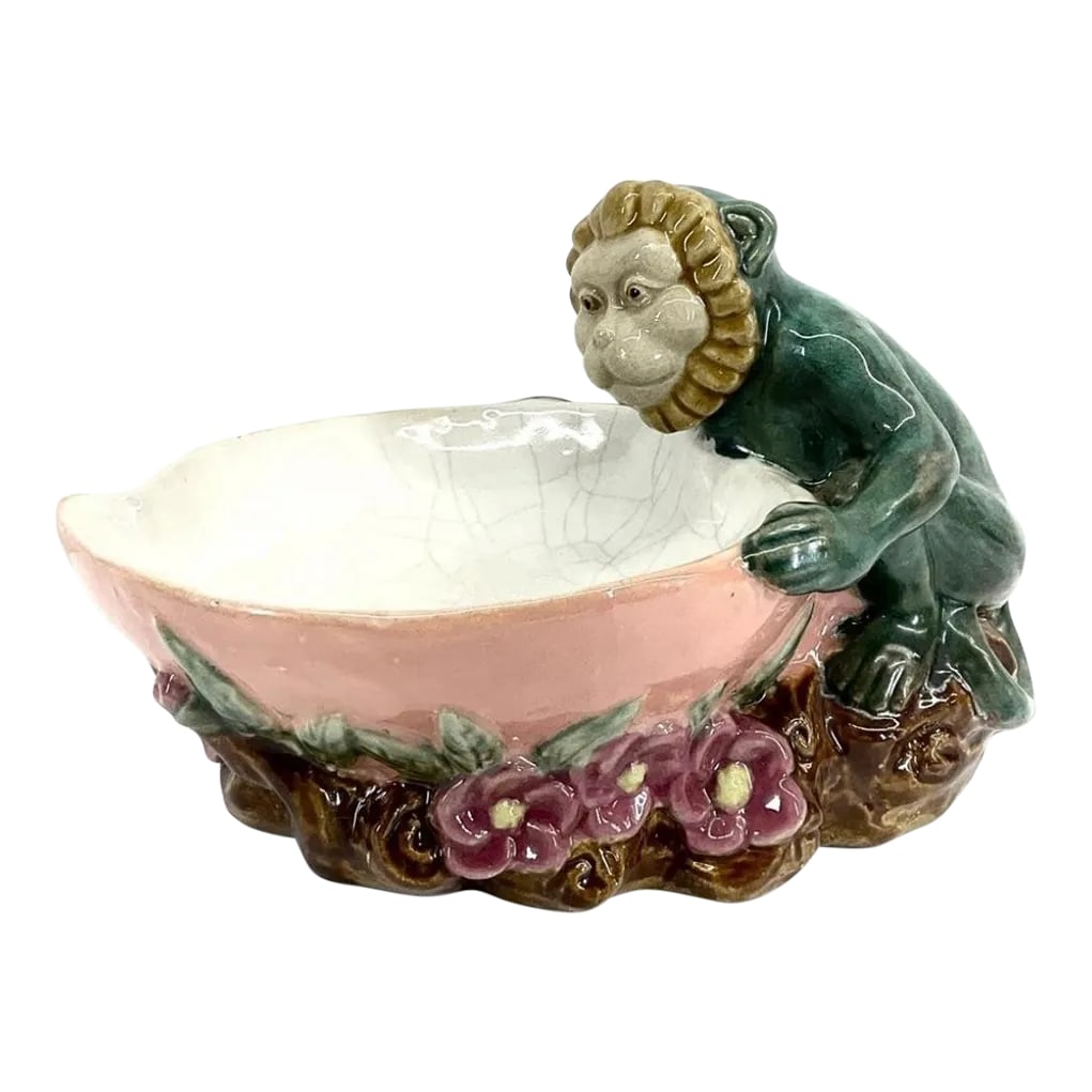 Vintage Signed Majolica Ceramic Monkey Bowl: A unique Majolica ceramic monkey decorative bowl. Perfect to hold keys or jewelry or on a bookshelf or tabletop. Signed on the bottom. In good condition with minor wear consistent with age, crazing.