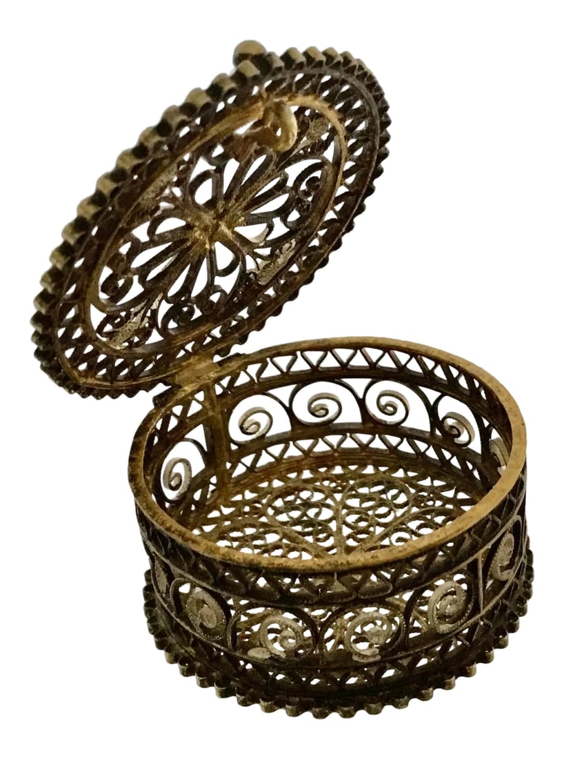 Antique Continental 800 Silver Miniature Ring Box: Beautiful filigree hinged lid miniature jewelry box. All hand made. 800 mark on bottom. Two tone - gold wash and silver. Condition: Alterations: Original Condition Unaltered Imperfections: Some Imperf