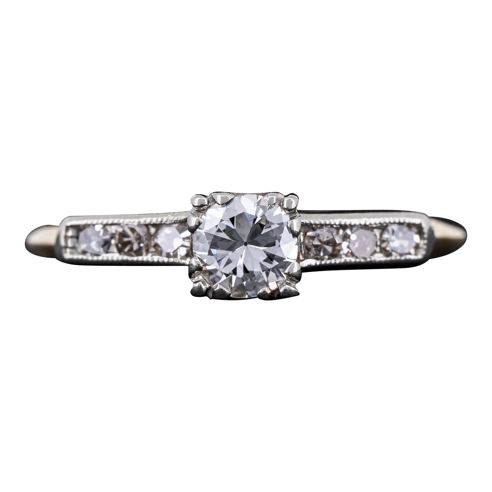 Vintage Art Deco Diamond Solitaire Made by Coplay 14k White Yellow Gold Ring Size 4.25: Vintage Art Deco diamond ring featuring a high quality 1/4 carat old European cut natural diamond accented by six round single cut natural diamonds set in 14k white and yellow gold. Condition: Very