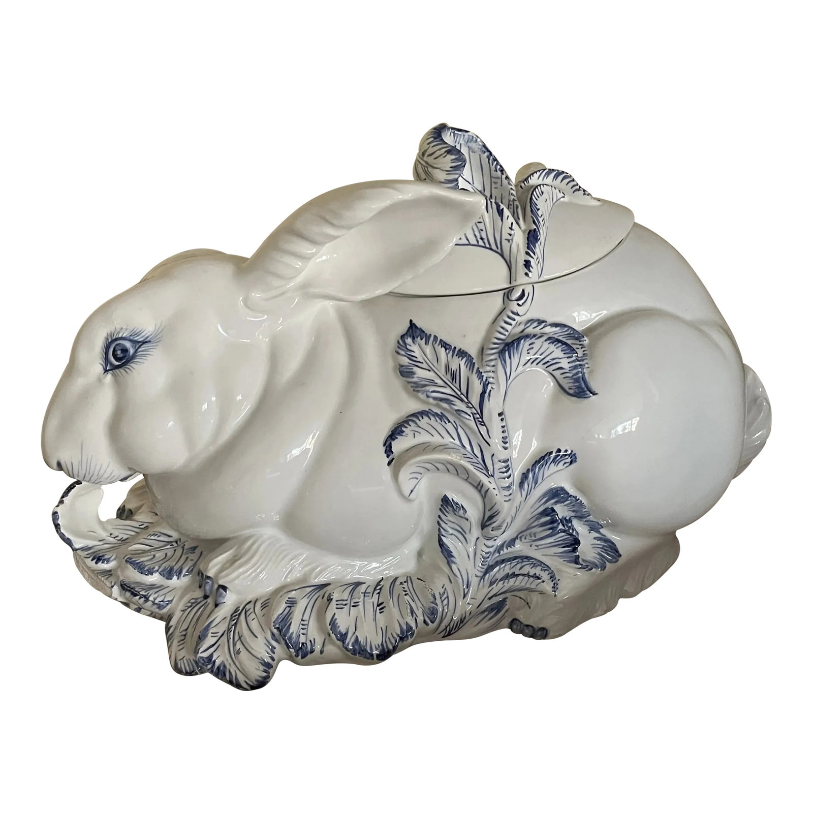 Blue and White Rabbit Tureen With Ladle: Beautiful large white rabbit with blue details feeding on the leaves below. Comes with a white ladle. It is from Italy and has markings on the bottom. Condition: Alterations: Original Condition