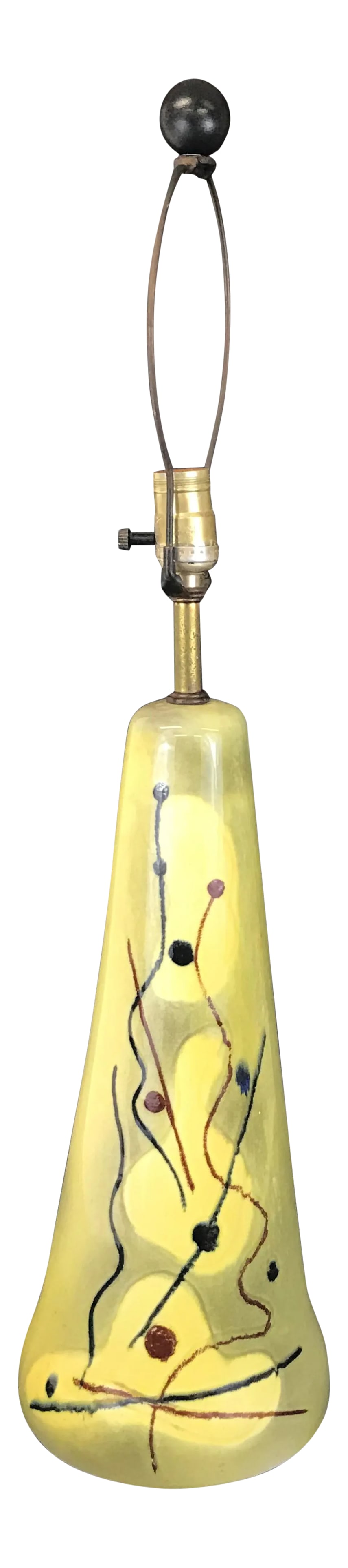 1940s Atomic Age Ceramic Table Lamp: Very playful table lamp from the atomic era. Attributed to Yasha Heifetz. Nice graphic design over the mottled yellow glaze. Original fixed harp, black ball finial, and wiring remain intact. ceramic