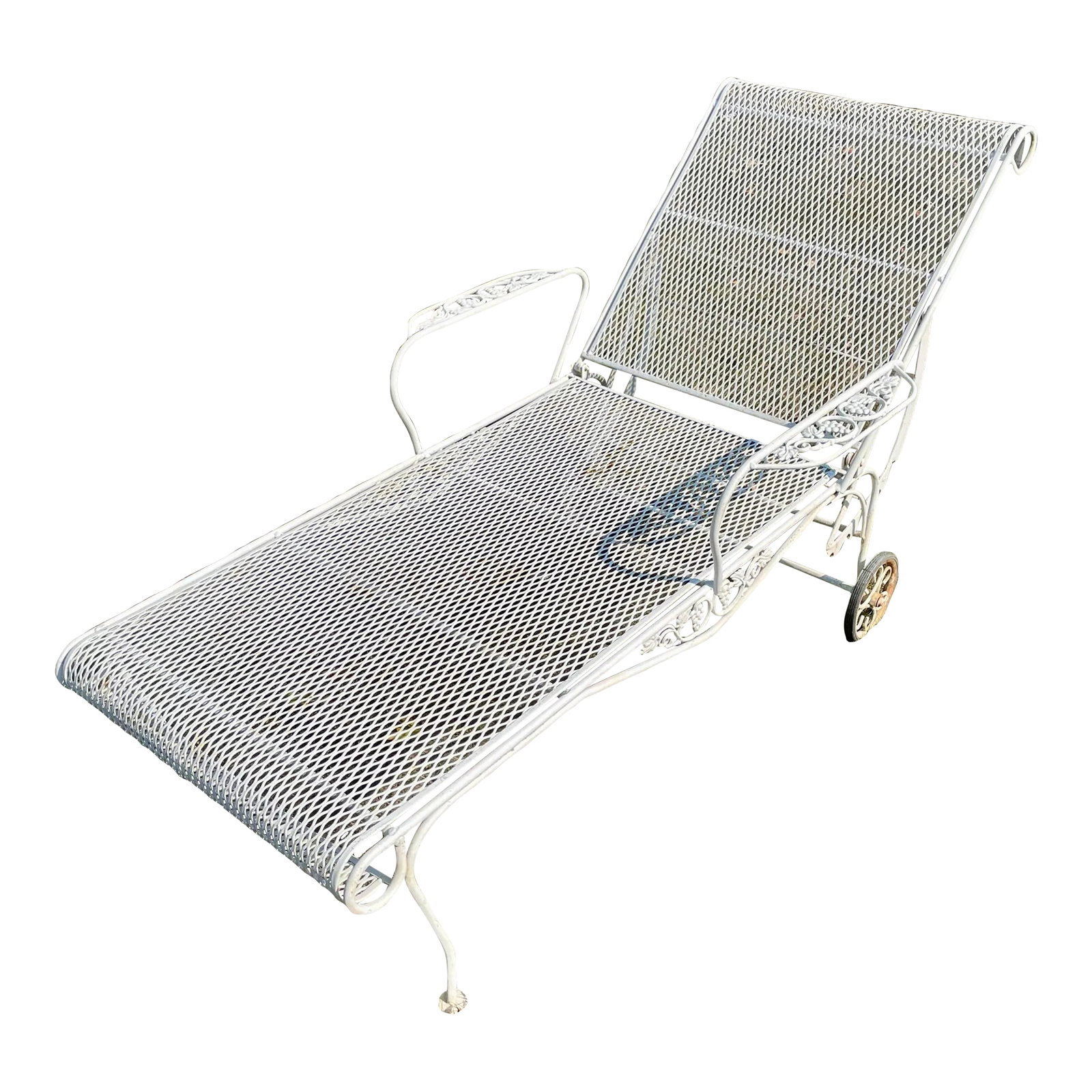 1960s White Wrought Iron Outdoor Chaise Patio Lounge Chair Salterini Inspired Grape Clusters: Outdoor Iron Chaise Lounge Chair in With a Rare Grape Leaf cluster design pattern. Back of chaise has the same design as is common with Vintage Salterini or Woodard. This chaise is in overall good