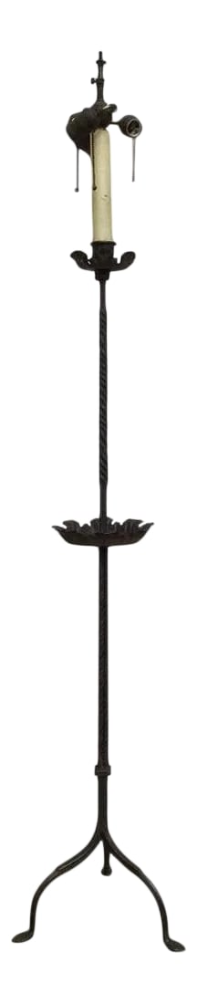 Spanish Baroque Wrought Iron Torchere Floor Lamp: A handsome Spanish Baroque style wrought iron torchere floor lamp with black patina. Beautifully handwrought and turned shaft supported by a tripod base. This date from the early 20th century, a time 