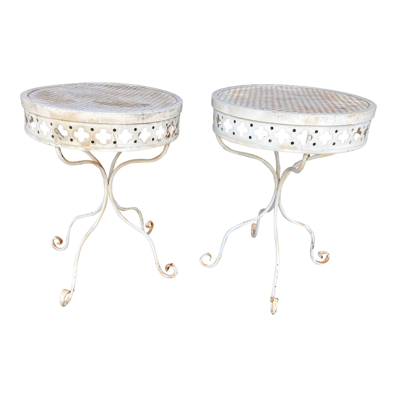 Mid 20th Century White Round Top Side Tables With Stamped Metal Apron - Set of 2: Pair of heavy outside patio tables. Each table has a keyhole stamped pattern apron and scrolled legs. They have evident rust (see pics) but are in structurally very good condition. Good original