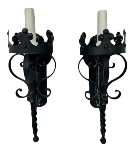Italian Style Iron Wall Sconces - a Pair: A beautiful pair of vintage Italian-style hand-forged iron wall sconces, showcasing traditional craftsmanship and timeless design. Each sconce features elegant scrollwork and crown-like detailing,