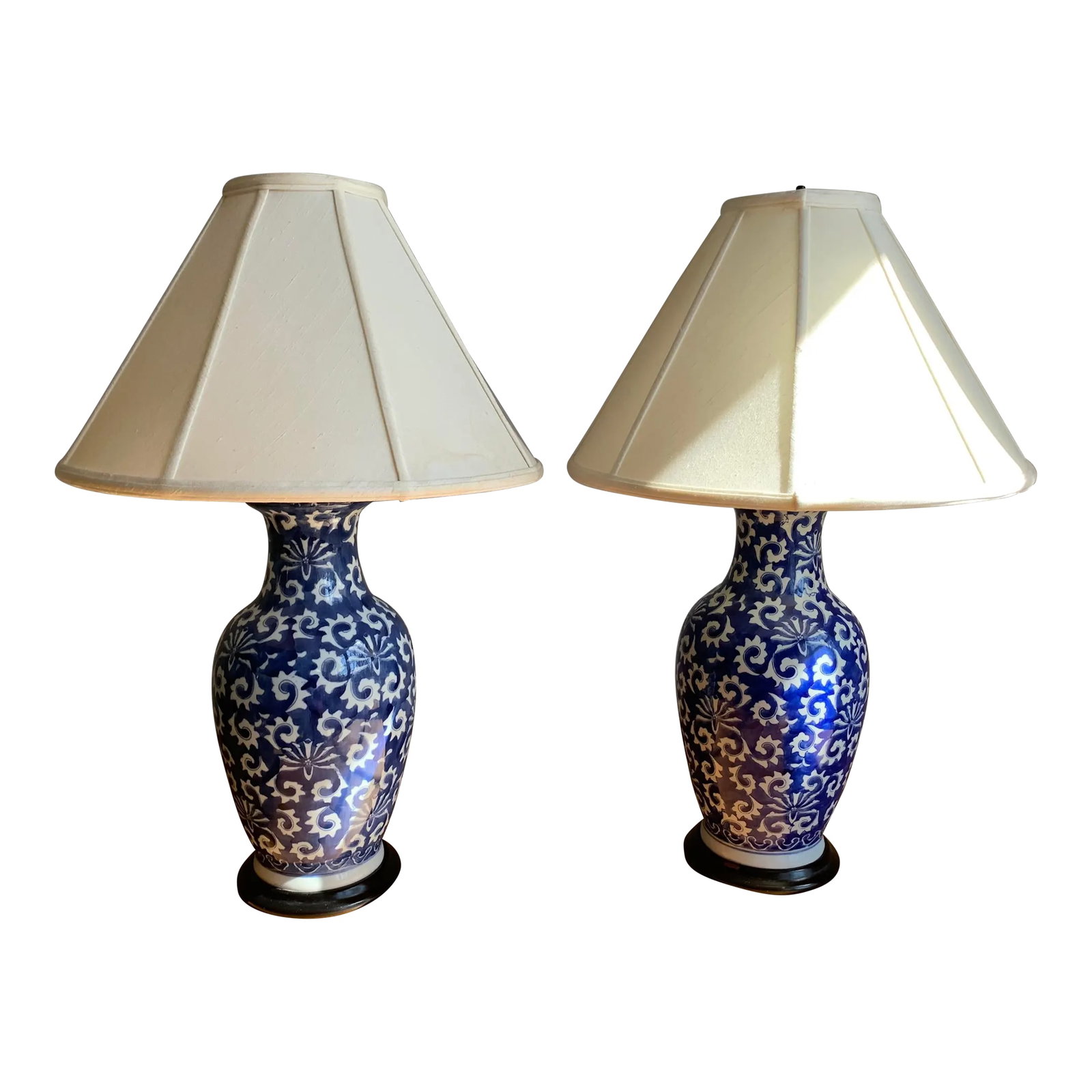 1980s Ginger Jar Lamps - a Pair: These end table lamps work well in a room with a lot of white detail: white sofa, drapes, linen table cloth. No other color is needed with the navy blue. The simple contrast is enough. Textures such a