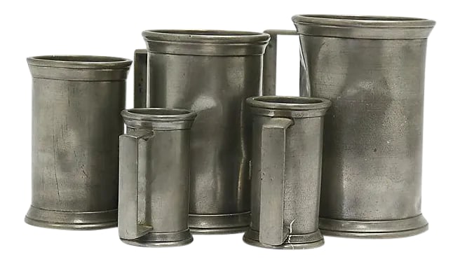 Antique Pewter Liquid Measuring Set - 5 Pieces: Set of five French pewter graduating measuring cups. Dimensions range from 2.5"L x 1.75"W x 3.25"H to 5"L x 3.75"W x 5.5"H. Impressed mark on underside. I will combine shipping whenever possible if