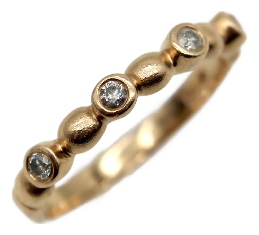 Vintage 14k Rose Gold Diamond Bubble Ring: This vintage 14k rose gold ring is a great stacking ring, with a bubble pattern that alternates between round diamonds and bubble shapes. There are four round diamonds all bezel set, connected by